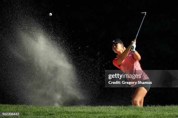 Danielle Kang hits from bunker to the sixth green during the first round of the LPGA Volvik Championship on May 24, 2018 at Travis Pointe Country...