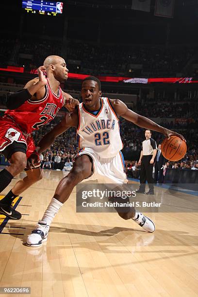 Jeff Green of the Oklahoma City Thunder dribbles against Taj Gibson the Chicago Bulls on January 27, 2010 at Ford Center in Oklahoma City, Oklahoma....