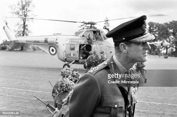 Prince Philip, Duke of Edinburgh, visiting the Infantry Junior Leaders Battalion at Park Hall Camp, Oswestry, Shropshire. In camouflaged battledress...