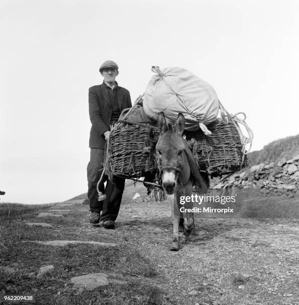 The last twenty three residents of Inishark Island , off the coast of County Galway, Ireland, are pictured evacuating the Island. The residents have...