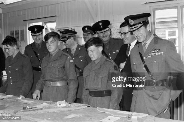 Prince Philip, Duke of Edinburgh, visiting the Infantry Junior Leaders Battalion at Park Hall Camp, Oswestry, Shropshire. The Duke looking at a...