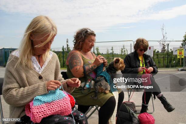 Three Anti- Frack Protestors Affectionately known as "Nanas" knit at the gates of the Fracking company "Cuadrilla's" Frack site during a quiet day of...