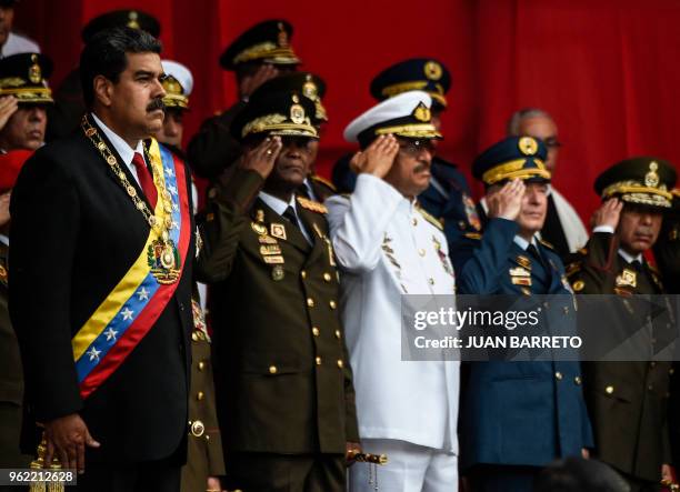 Venezuelan President Nicolas Maduro and members of the military high command attend a military honour ceremony in Caracas on May 24, 2018.