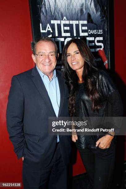 Journalist Jean-Pierre Pernaut and his wife Miss France 1987 Nathalie Marquay attend the "La tete dans les etoiles" Theater play at Theatre de la...