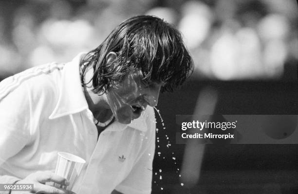 Ilie Nastase, Romanian Tennis Player, feels the heat at Wimbledon Tennis Championships, temperatures of 104 degrees were registered on the Centre...