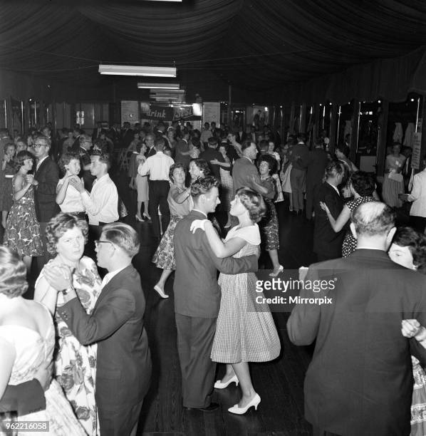 The Seventh World Congress of Spinsters and Bachelors, Grevenbicht, Holland. A dance is held in the Congress Pavilion, during which the Congress is...