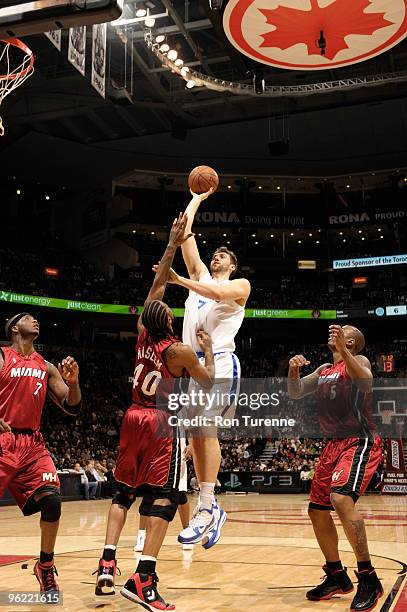 Andrea Bargnani of the Toronto Raptors puts up the jump hook over Udonis Haslem of the Miami Heat during a game on January 27, 2010 at the Air Canada...