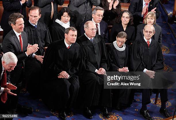 Members of the U.S. Supreme Court listen to U.S. President Barack Obama speak to both houses of Congress during his first State of the Union address...