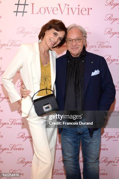 Ines de la Fressange and Diego Della Valle attend Roger Vivier "#LoveVivier" Book Launch Cocktail on May 24, 2018 in Paris, France.