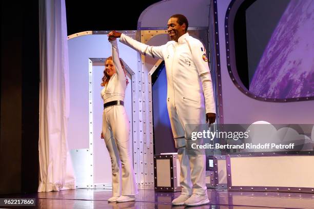 Valentine Kipp and Eric Blanc acknowledge the applause of the audience at the end of the "La tete dans les etoiles" Theater play at Theatre de la...