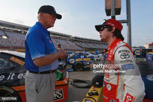 Team owner, Joe Gibbs, speaks with Erik Jones, driver of the Circle K Toyota, during qualifying for the Monster Energy NASCAR Cup Series Coca-Cola...