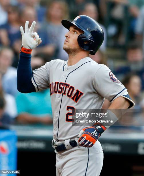 Alex Bregman of the Houston Astros celebrates after hitting a three-run home run off starting pitcher Mike Clevinger of the Cleveland Indians during...