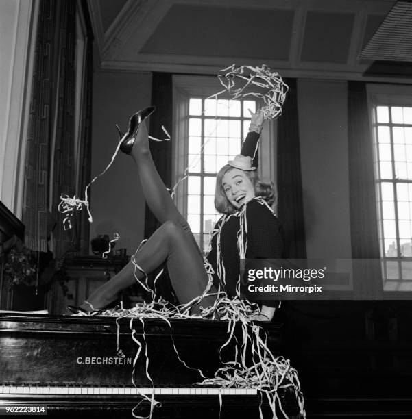 Shirley Eaton rehearsing for the television show 'Saturday Spectacular' on ITV. Camden Town, London, 30th December 1960.