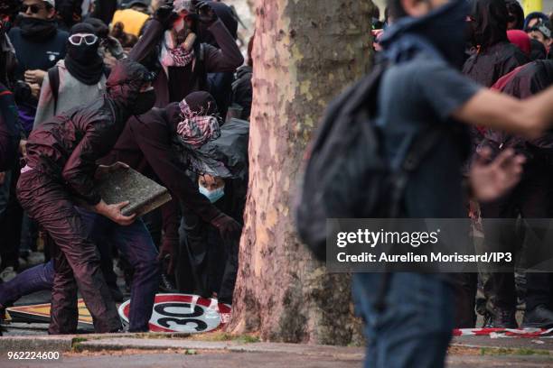 Clashes erupt between the leading cortege of Black Block and the police at the demonstration of civil servants in defense of the public service on...