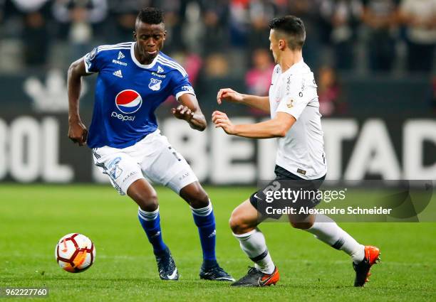Jader Valencia of Milionarios and Mantuan of Corinthians of Brazil in action during the match for the Copa CONMEBOL Libertadores 2018 at Arena...