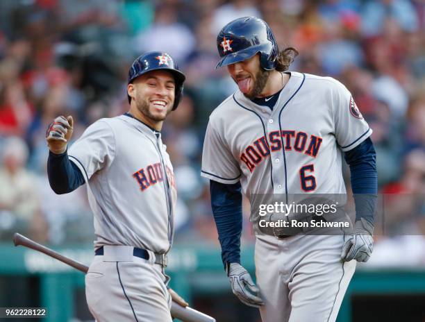 Jake Marisnick of the Houston Astros celebrates with George Springer after hitting a three-run home run off Neil Ramirez of the Cleveland Indians...