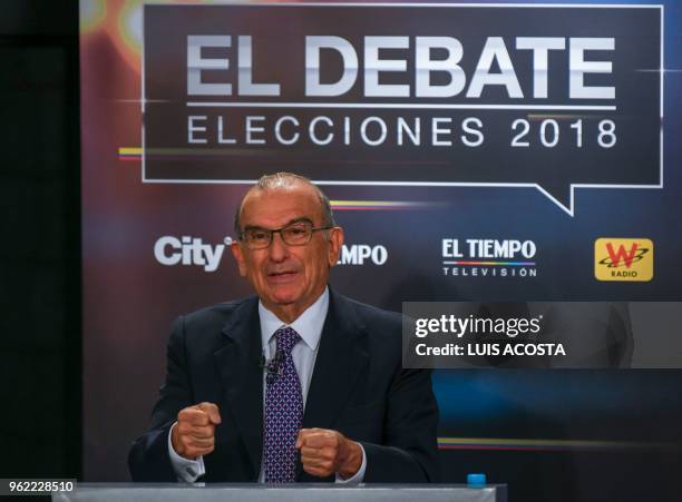 Liberal Party presidential candidate Humberto de la Calle takes part in a TV debate in Bogota on May 24, 2018. - Colombia will hold presidential...