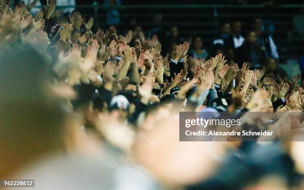 Fans of Corinthians of Brazil cheer during the match against Milionarios for the Copa CONMEBOL Libertadores 2018 at Arena Corinthians Stadium on May...