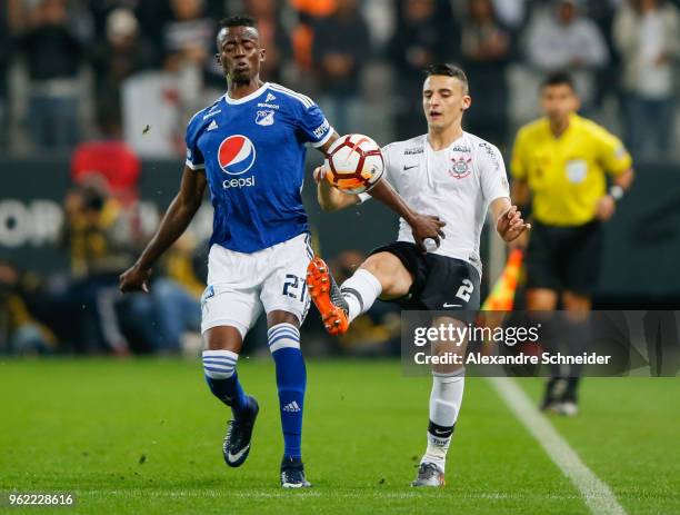 Jader Valencia of Milionarios and Mantuan of Corinthians of Brazil in action during the match for the Copa CONMEBOL Libertadores 2018 at Arena...