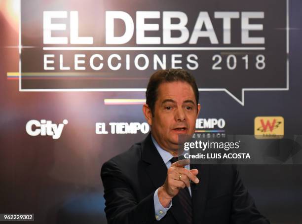 Colombian presidential candidate German Vargas Lleras, for the Cambio Radical Party takes part in a TV debate in Bogota on May 24, 2018. Colombia...