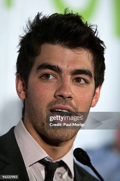 Joe Jonas of Jonas Brothers says a few words to the audience at the Eunice Kennedy Shriver Act support reception at the Hart Building on January 27,...