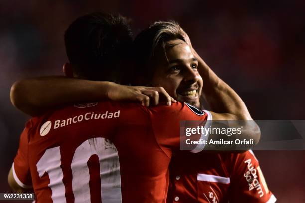 Martin Benitez of Independiente celebrates with teammate Fernando Gaibor after scoring the opening goal during a match between Independiente and...