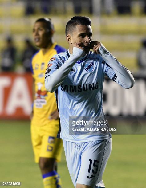 Bolivia's Bolivar player Juan Miguel Callejon celebrates after scoring against Ecuador's Delfin during their Copa Libertadores football match at...