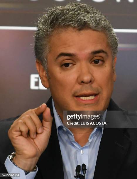 Colombian presidential candidate Ivan Duque, for the Democratic Center Party take part in a TV debate in Bogota on May 24, 2018. Colombia will hold...