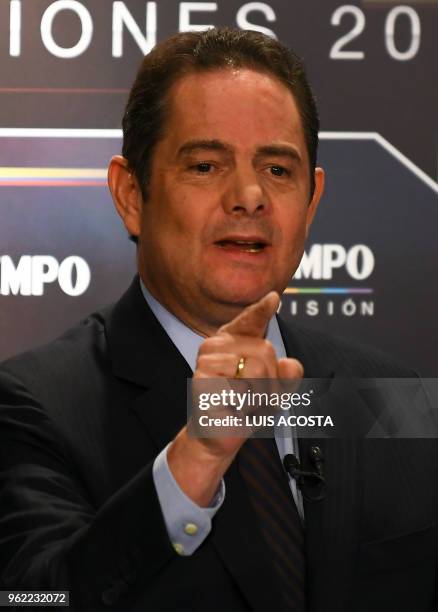 Colombian presidential candidate German Vargas Lleras, for the Cambio Radical Party takes part in a TV debate in Bogota on May 24, 2018. - Colombia...