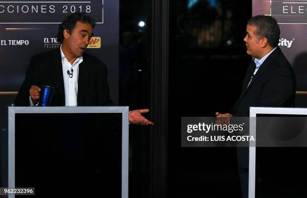 Colombian presidential candidates Sergio Fajardo, for the Colombia Coalition and Ivan Duque, for the Democratic Center Party take part in a TV debate...