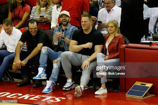 Music artist Justin Timberlake and NFL player J. J. Watt of the Houston Texans attend Game Five of the Western Conference Finals of the 2018 NBA...