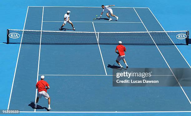 Michael Kohlmann of Germany and Jarkko Nieminen of Finland in their semifinal doubles match against Bob and Mike Bryan of the USA during day eleven...