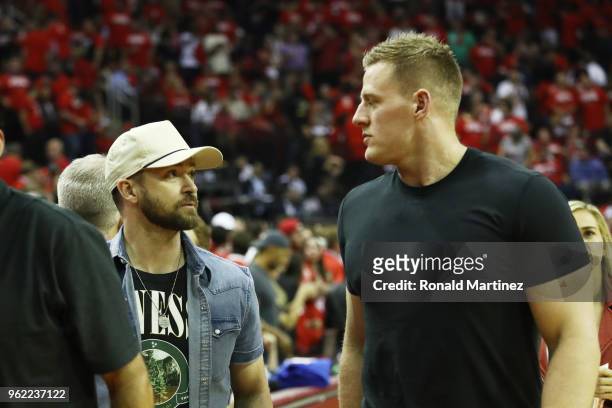 Music artist Justin Timberlake and NFL player J. J. Watt of the Houston Texans attend Game Five of the Western Conference Finals of the 2018 NBA...