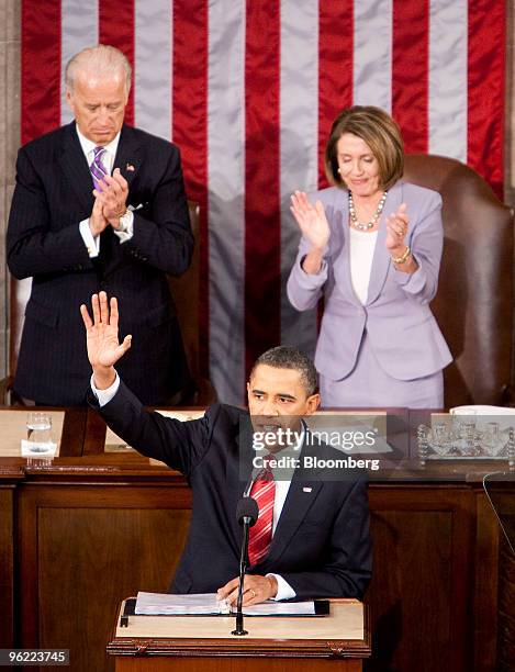 President Barack Obama waves after delivering the State of the Union address to Congress at the Capitol in Washington, D.C., U.S., on Wednesday, Jan....