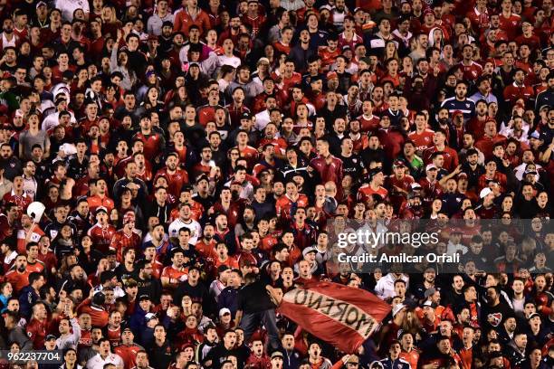 Fans of Independiente cheer for their team during a match between Independiente and Deportivo Lara as part of Copa CONMEBOL Libertadores 2018 at...