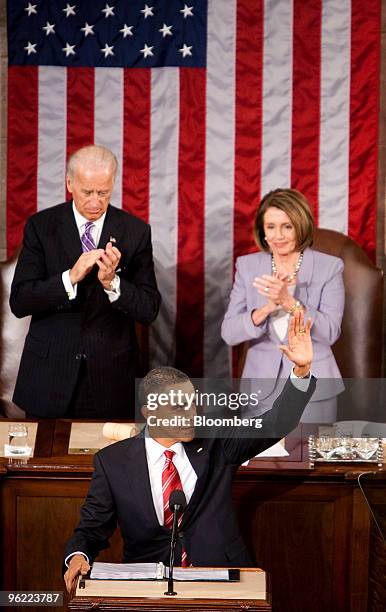 President Barack Obama waves after delivering the State of the Union address to Congress at the Capitol in Washington, D.C., U.S., on Wednesday, Jan....