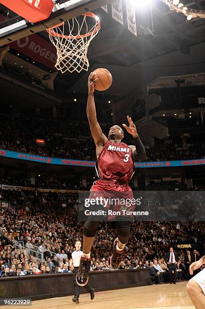 Dwyane Wade of the Miami Heat lays one in against the Toronto Raptors during a game on January 27, 2010 at the Air Canada Centre in Toronto, Ontario,...