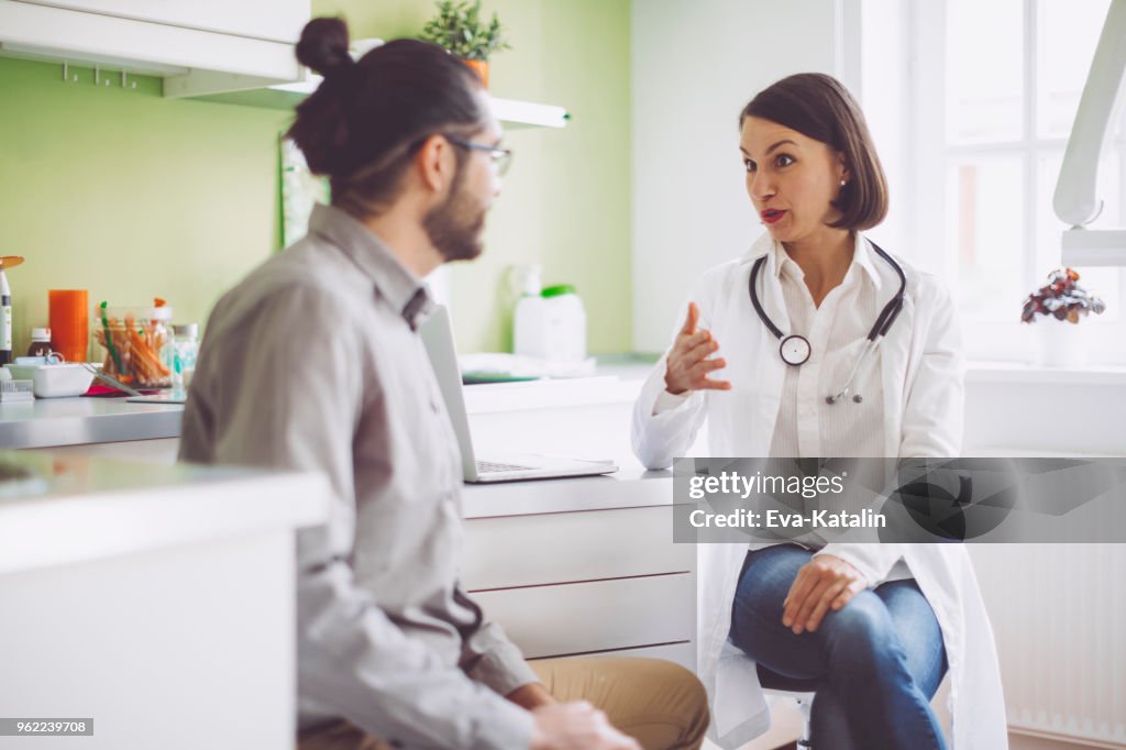 Doctor consulting her patient