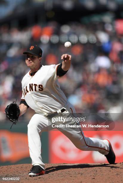 Tony Watson of the San Francisco Giants pitches against the Colorado Rockies in the top of the ninth inning at AT&T Park on May 19, 2018 in San...