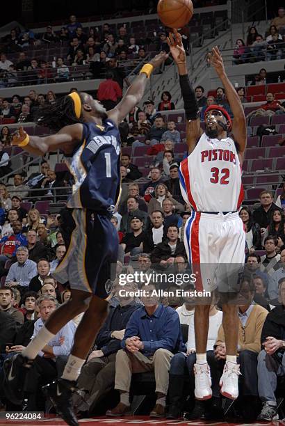 Richard Hamilton of the Detroit Pistons goes up for a shot attempt against DeMarre Carroll of the Memphis Grizzlies in a game at the Palace of Auburn...