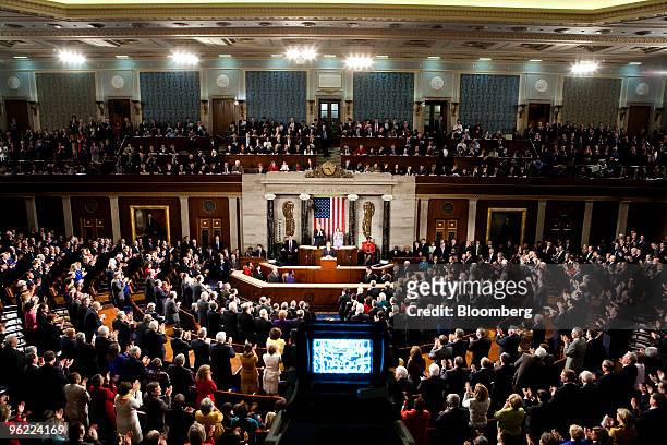 President Barack Obama is applauded by Republicans as he delivers the State of the Union address to Congress at the Capitol in Washington, D.C.,...