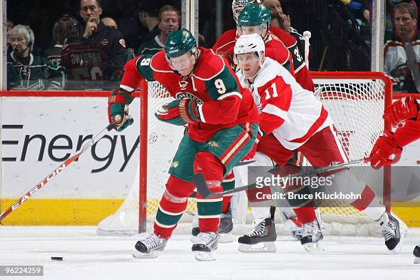 Mikko Koivu of the Minnesota Wild reacts after being high sticked by Daniel Cleary of the Detroit Red Wings during the game at the Xcel Energy Center...