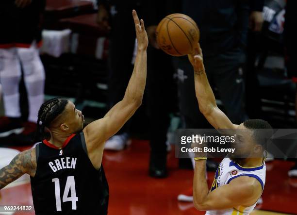 Gerald Green of the Houston Rockets defends against Stephen Curry of the Golden State Warriors in the fourth quarter of Game Five of the Western...