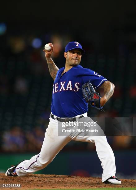 Matt Bush of the Texas Rangers throws in the eight inning against the Kansas City Royals at Globe Life Park in Arlington on May 24, 2018 in...