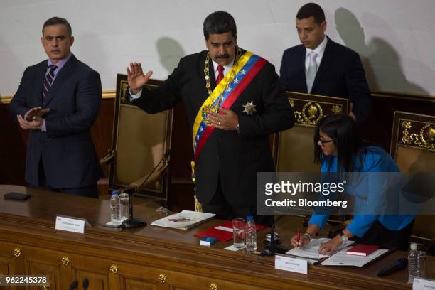 Nicolas Maduro, Venezuela's president, center, gestures during a swearing-in ceremony in Caracas, Venezuela, on Thursday, May 24, 2018. After calling...