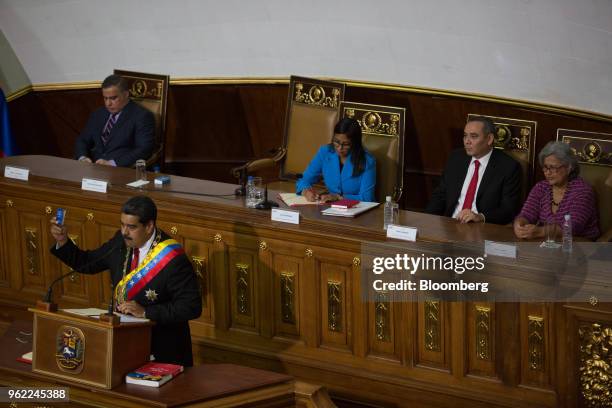 Nicolas Maduro, Venezuela's president, bottom left, speaks during a swearing-in ceremony in Caracas, Venezuela, on Thursday, May 24, 2018. After...