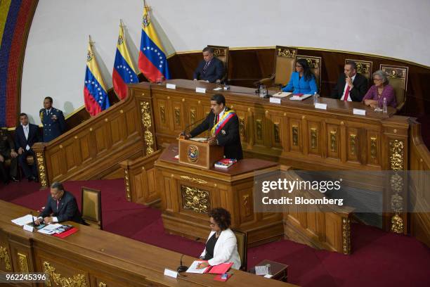 Nicolas Maduro, Venezuela's president, center, speaks during a swearing-in ceremony in Caracas, Venezuela, on Thursday, May 24, 2018. After calling...