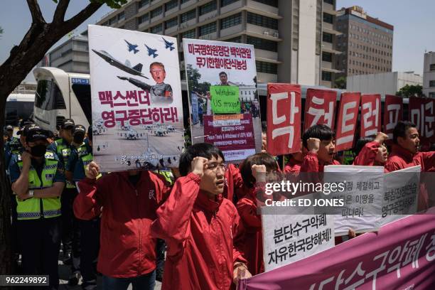 Anti-US protesters hold a rally outside the US embassy in Seoul on May 25, 2018. - Donald Trump's abrupt cancellation of a summit with Kim Jong Un...