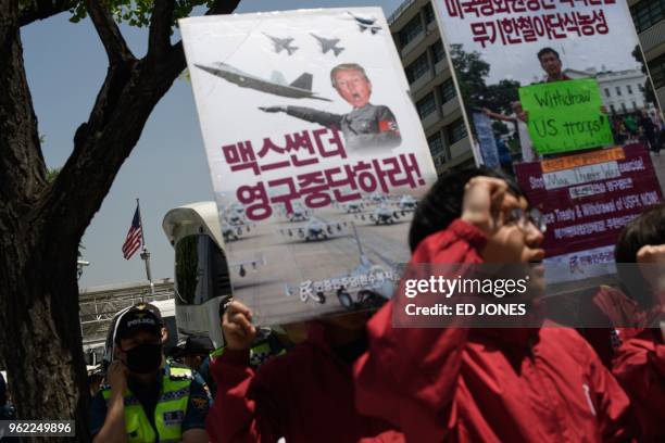 Anti-US protesters hold a rally outside the US embassy in Seoul on May 25, 2018. - Donald Trump's abrupt cancellation of a summit with Kim Jong Un...