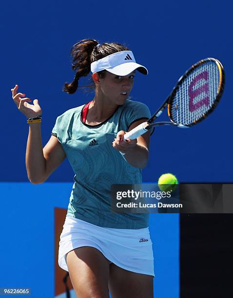 Laura Robson of Great Britain plays a forehand in her quarterfinal juniors match against Ester Goldfeld of the USA during day eleven of the 2010...